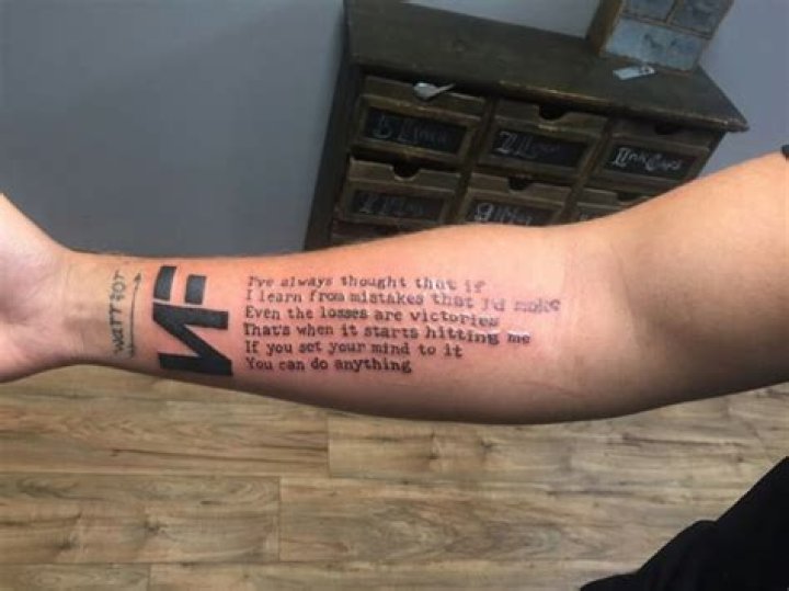 Does NF Have Any Tattoos?