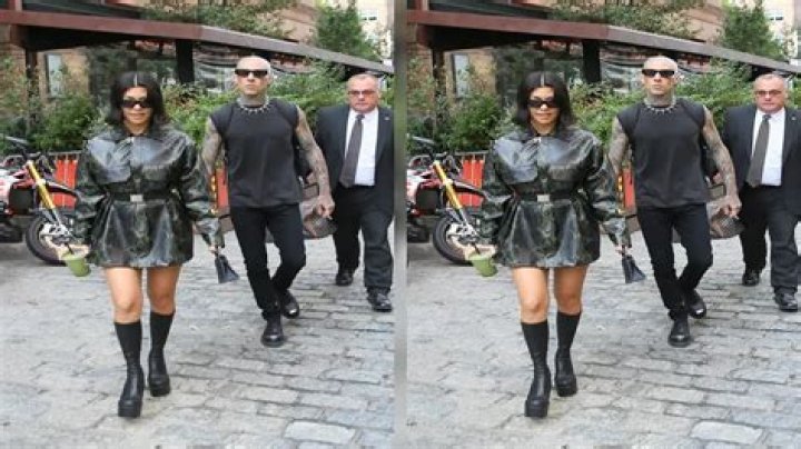Kourtney Kardashian Steps Out With Travis Barker In Snakeskin Mini Coat & Boots After ‘SNL’ Spoof